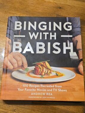 Source Unknown Binging with Babish Hardcover — Black and Orange